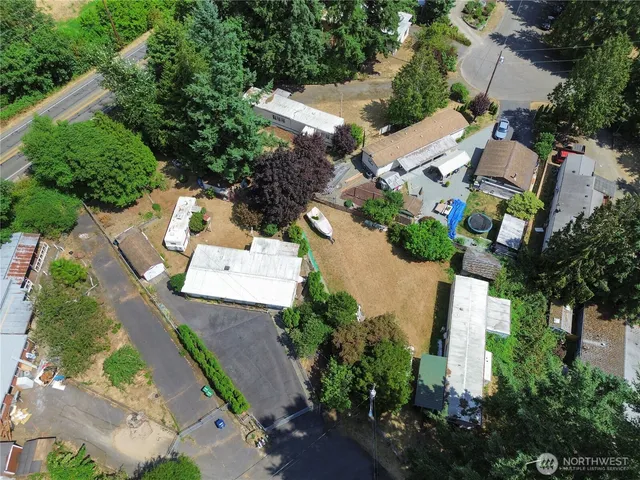 an aerial view of residential house with outdoor space