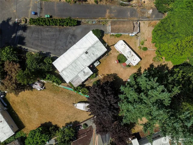 an aerial view of a house with a garden