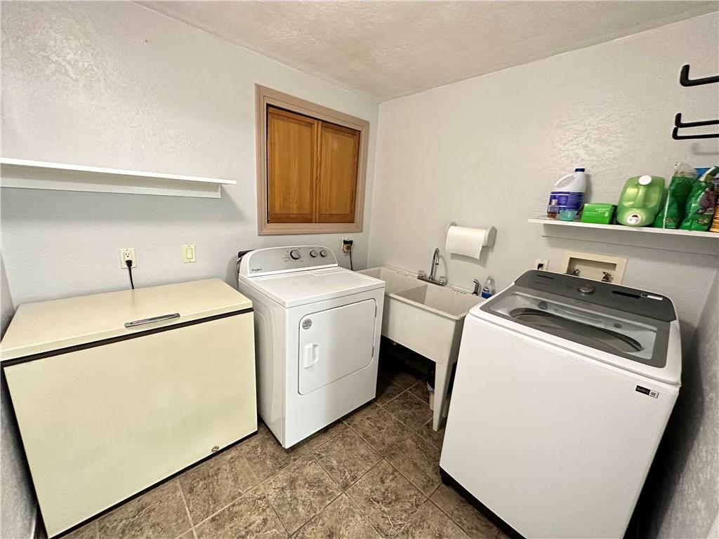 3021 Langley Road Uniontown, PA 15401 - Photo 11 of 28 a utility room with dryer and washer