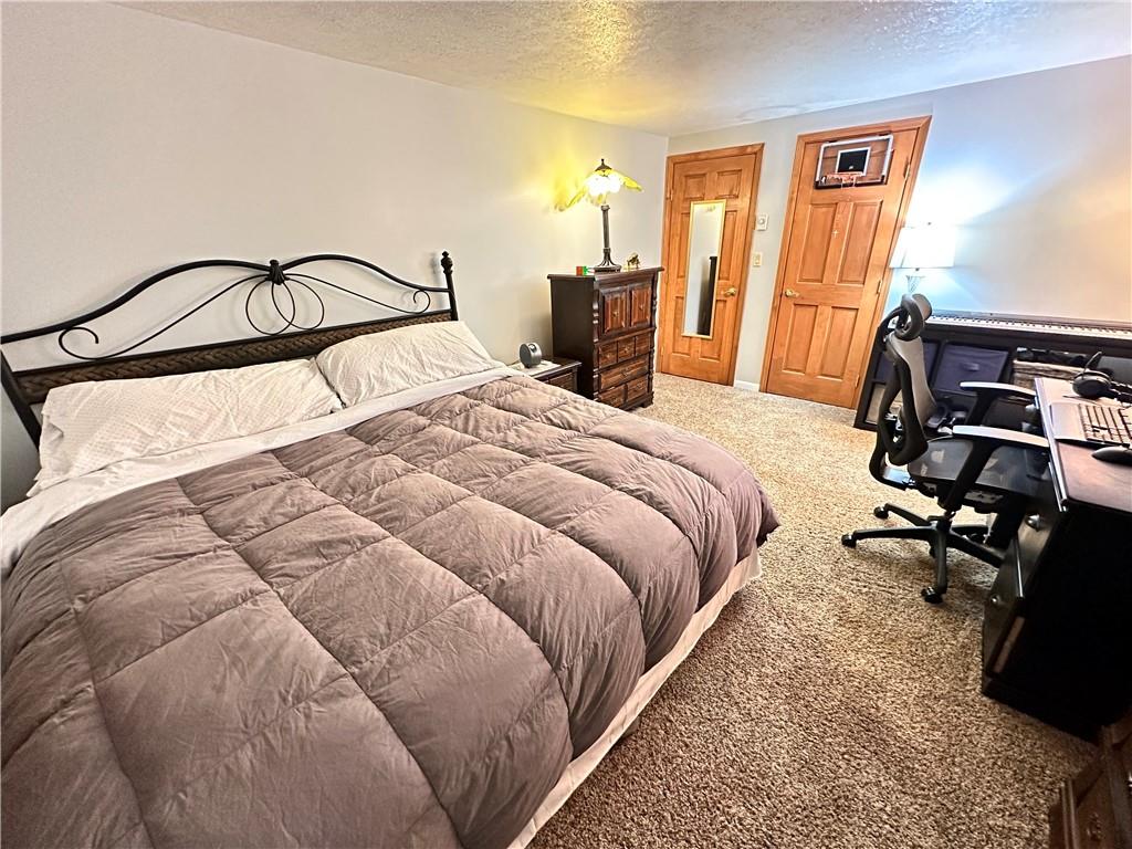 3021 Langley Road Uniontown, PA 15401 - Photo 18 of 28 a bedroom with a bed and dresser