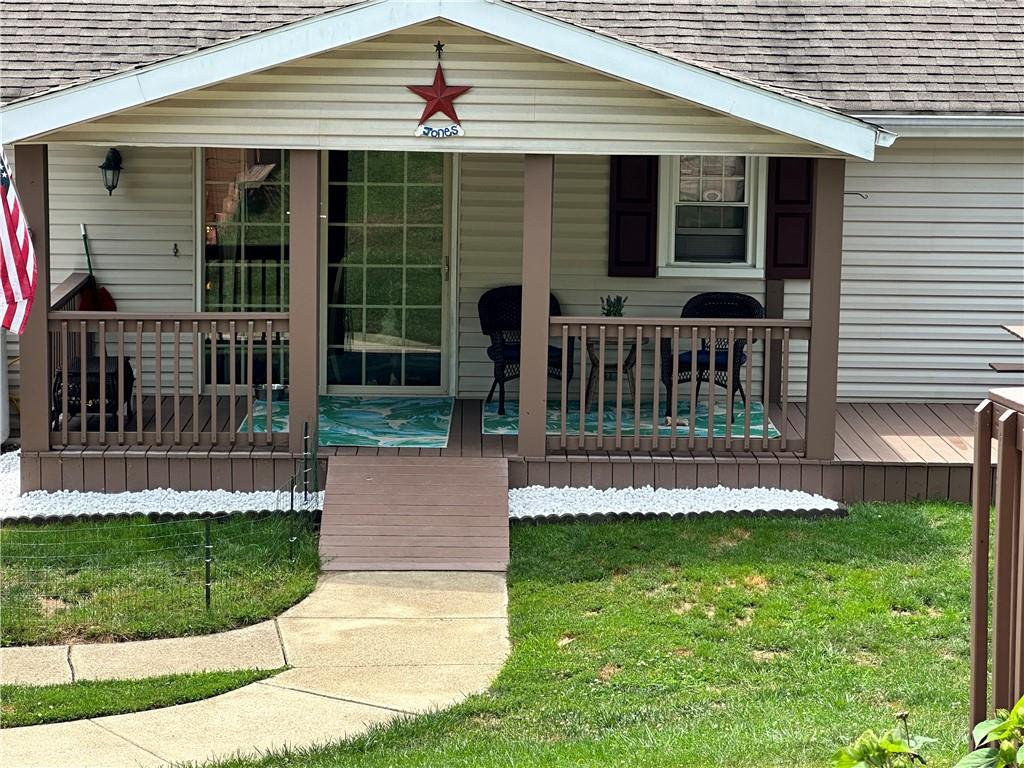 3021 Langley Road Uniontown, PA 15401 - Photo 21 of 28 a view of house with a yard and sitting area