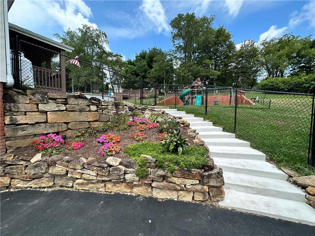3021 Langley Road Uniontown, PA 15401 - Photo 3 of 28 a view of a house with a yard and table and chairs