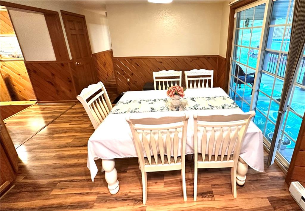 3021 Langley Road Uniontown, PA 15401 - Photo 9 of 28 a view of a dining room with furniture and wooden floor