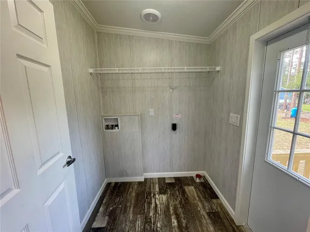 a backyard of a house with seating space