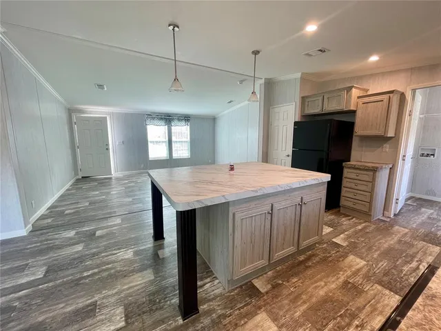 a bathroom with a sink double vanity granite and a mirror
