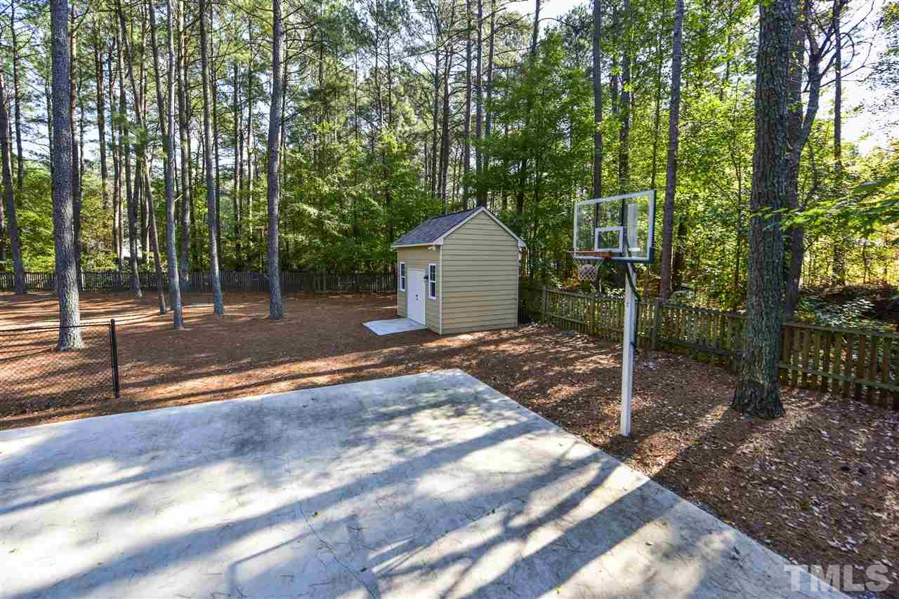 200 Release Circle Raleigh, NC 27615 - Photo 22 of 25 a backyard of a house with lots of green space
