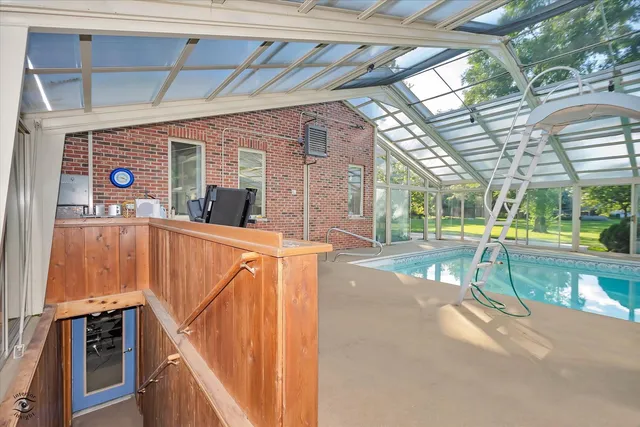 a view of a swimming pool with a patio