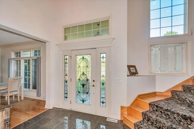 a front view of a house with natural light