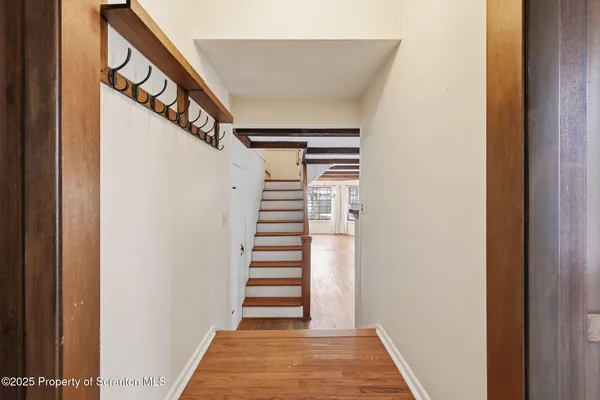a view of livingroom with hardwood floor and ceiling fan