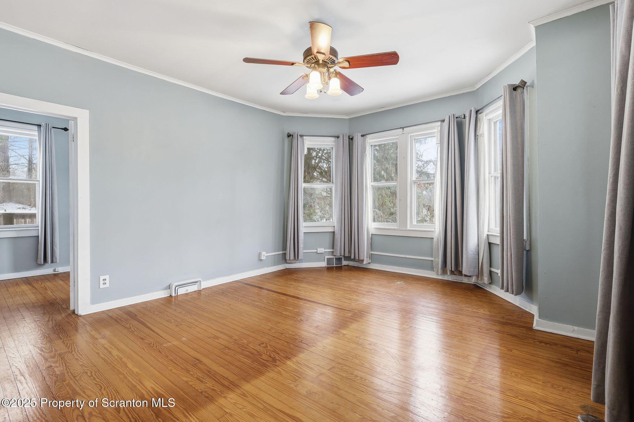2457 Airport Road Forest City, PA 18421 - Photo 44 of 78 a view of an empty room with window and wooden floor