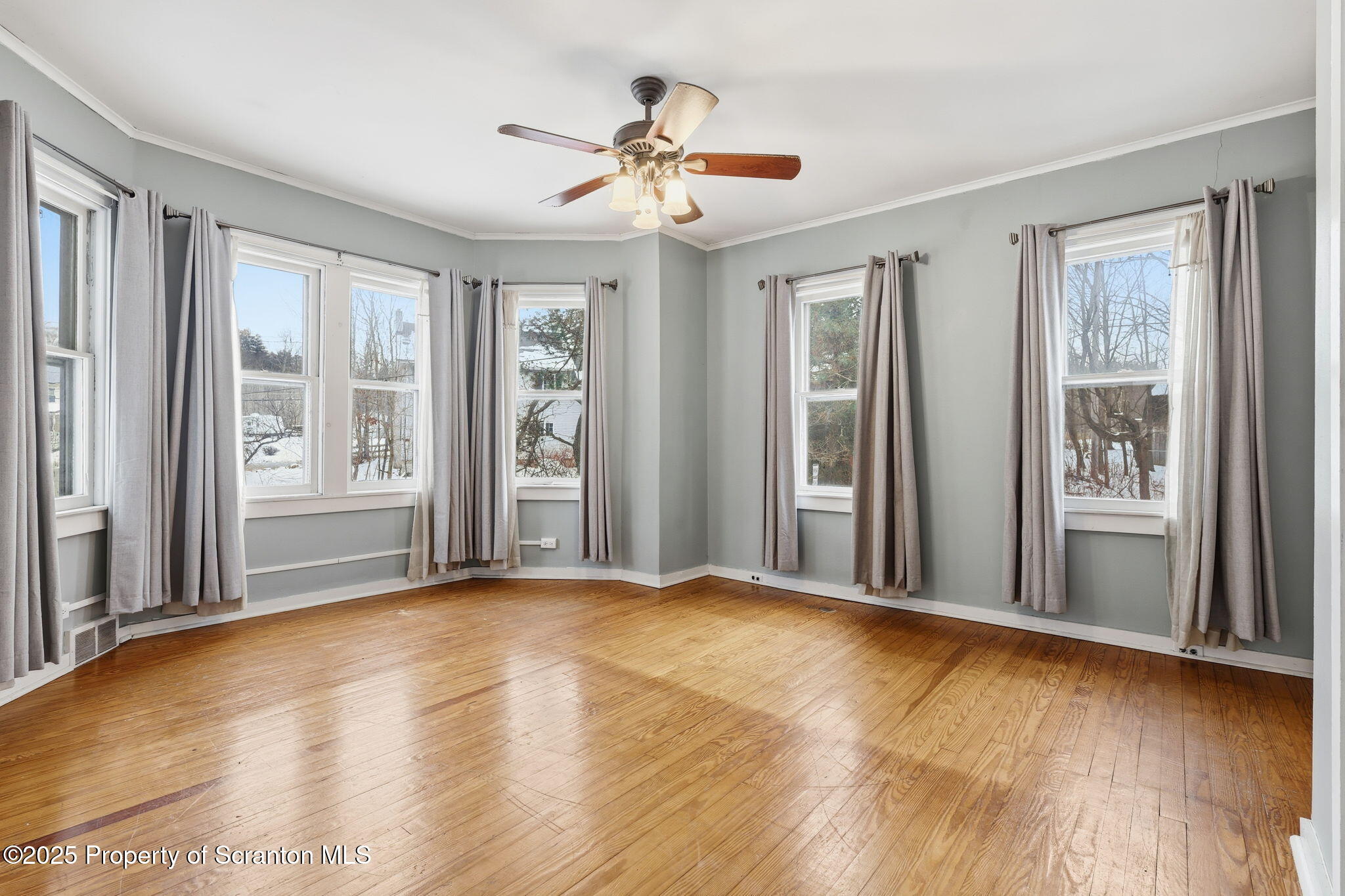 2457 Airport Road Forest City, PA 18421 - Photo 45 of 78 a view of livingroom with hardwood floor and ceiling fan