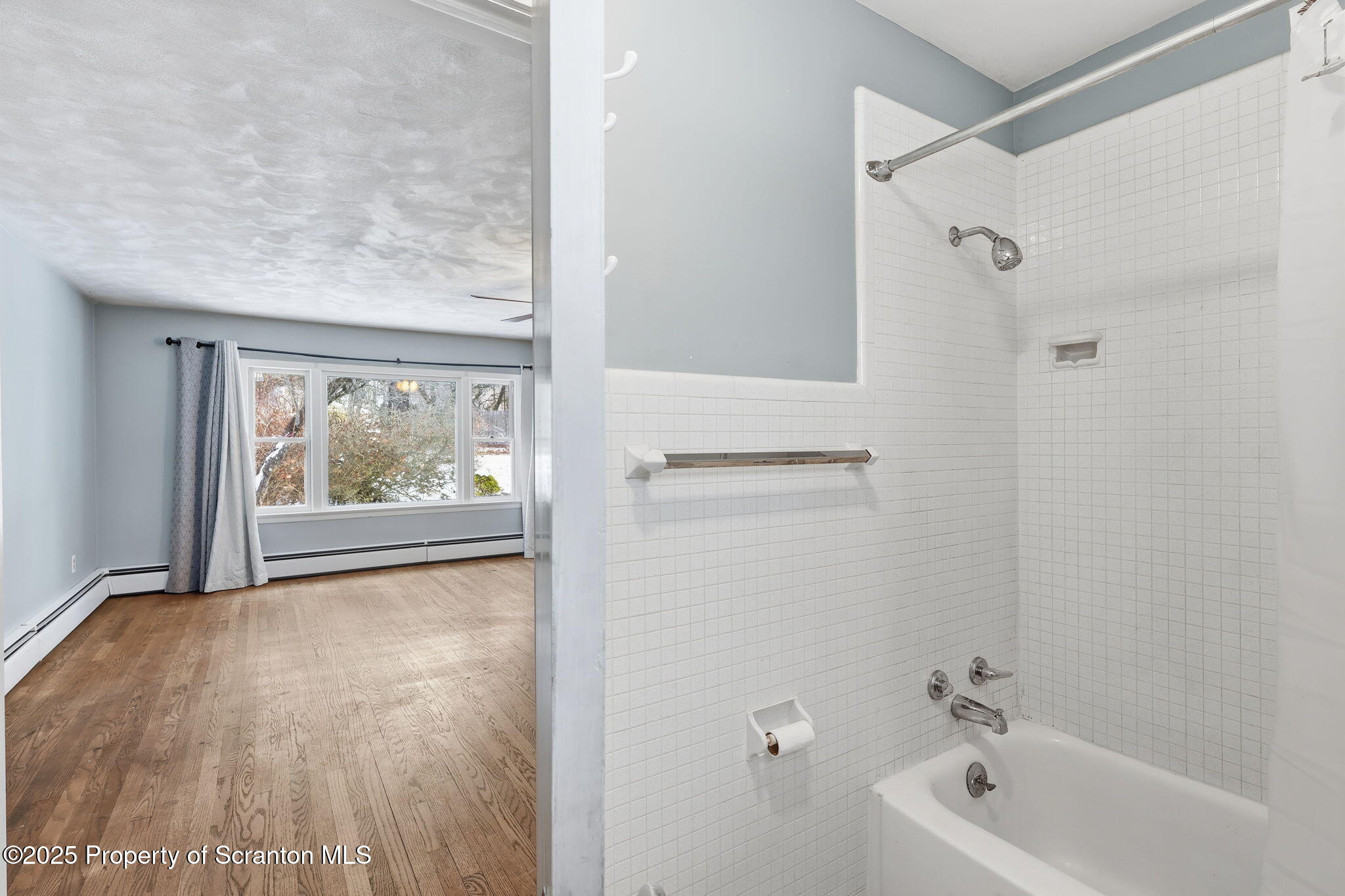 2457 Airport Road Forest City, PA 18421 - Photo 46 of 82 a bathroom with a bathtub and shower