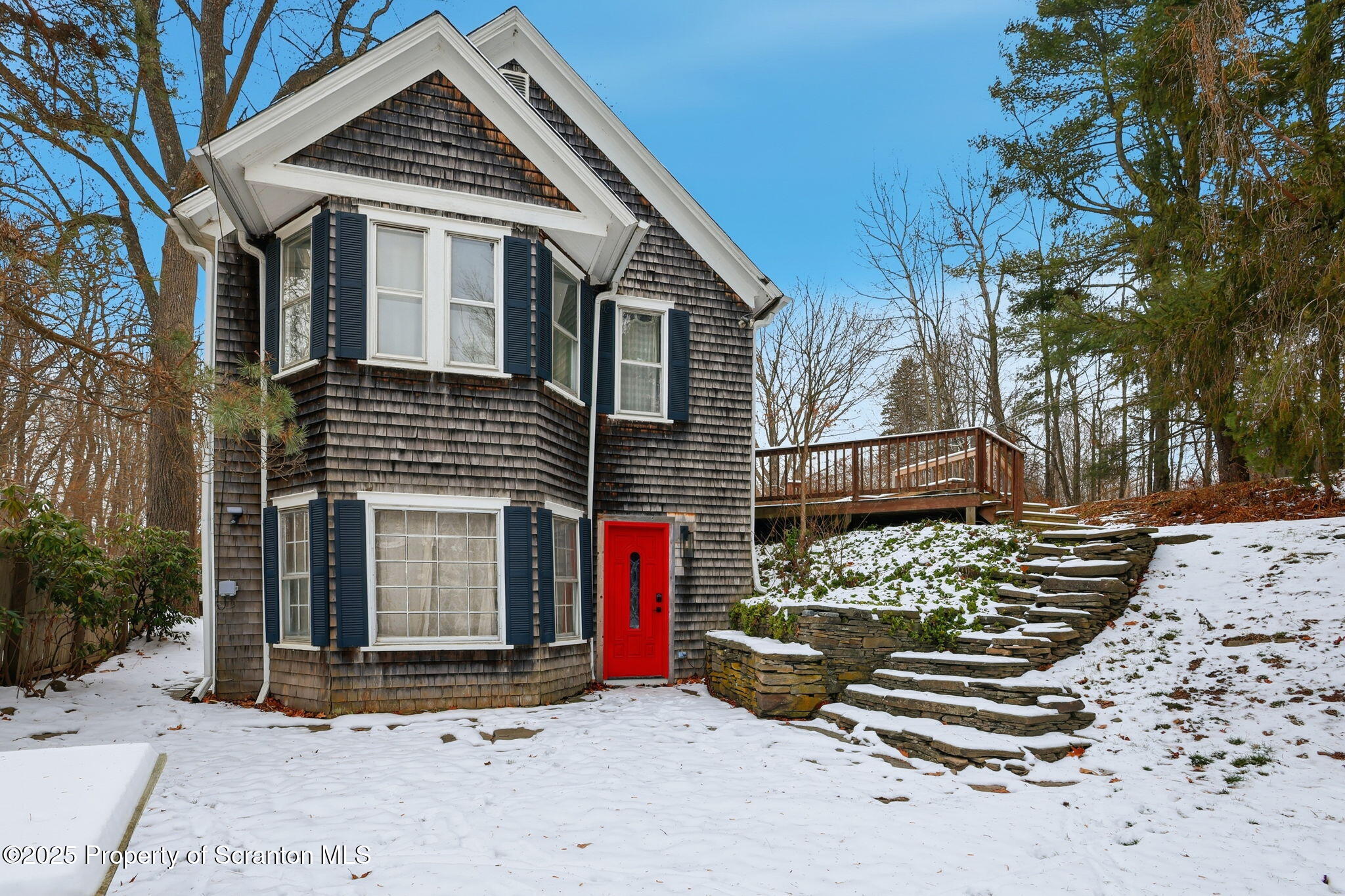 2457 Airport Road Forest City, PA 18421 - Photo 5 of 78 a front view of a house with a tree