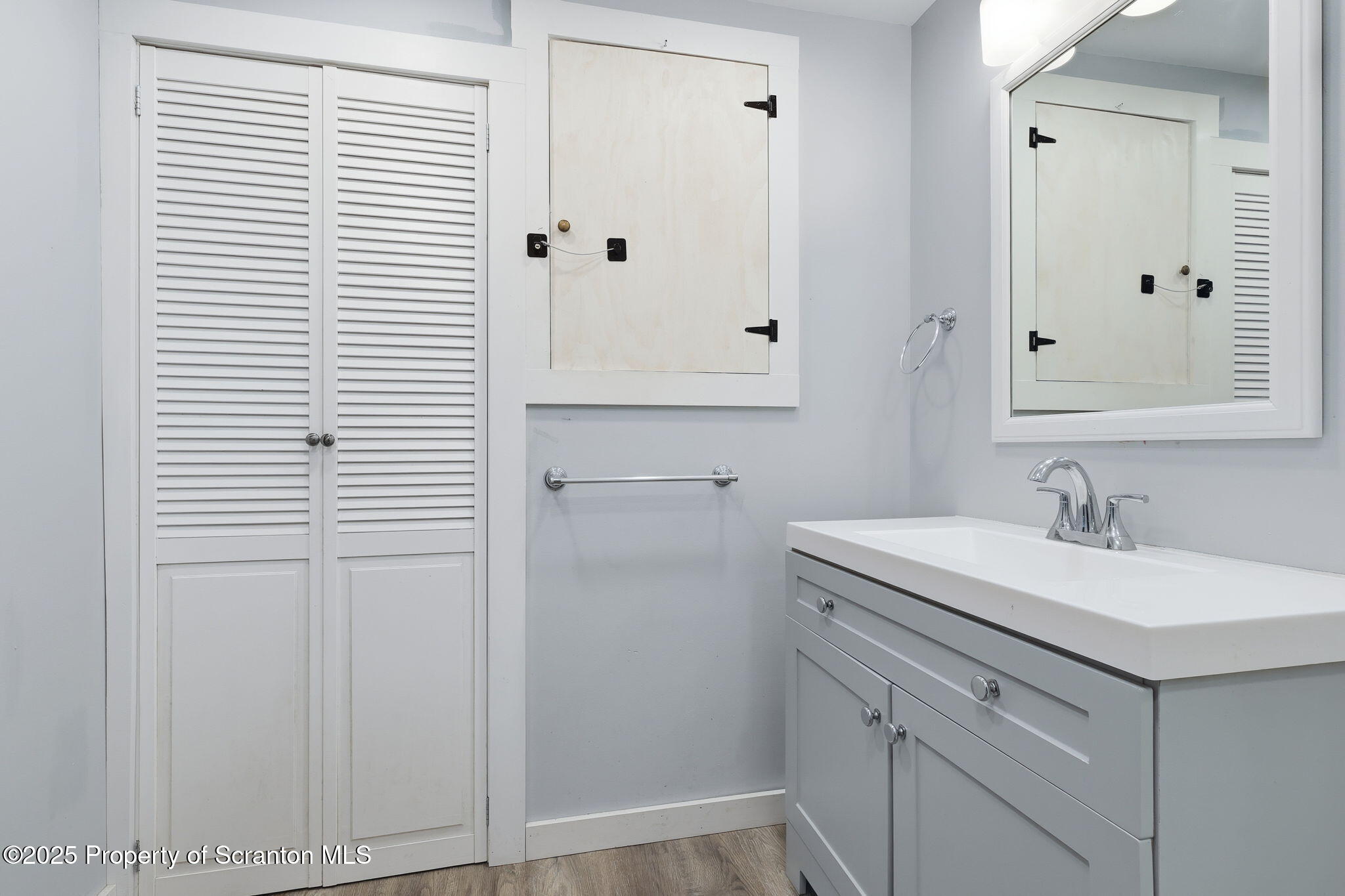 2457 Airport Road Forest City, PA 18421 - Photo 59 of 82 a bathroom with a sink and a mirror
