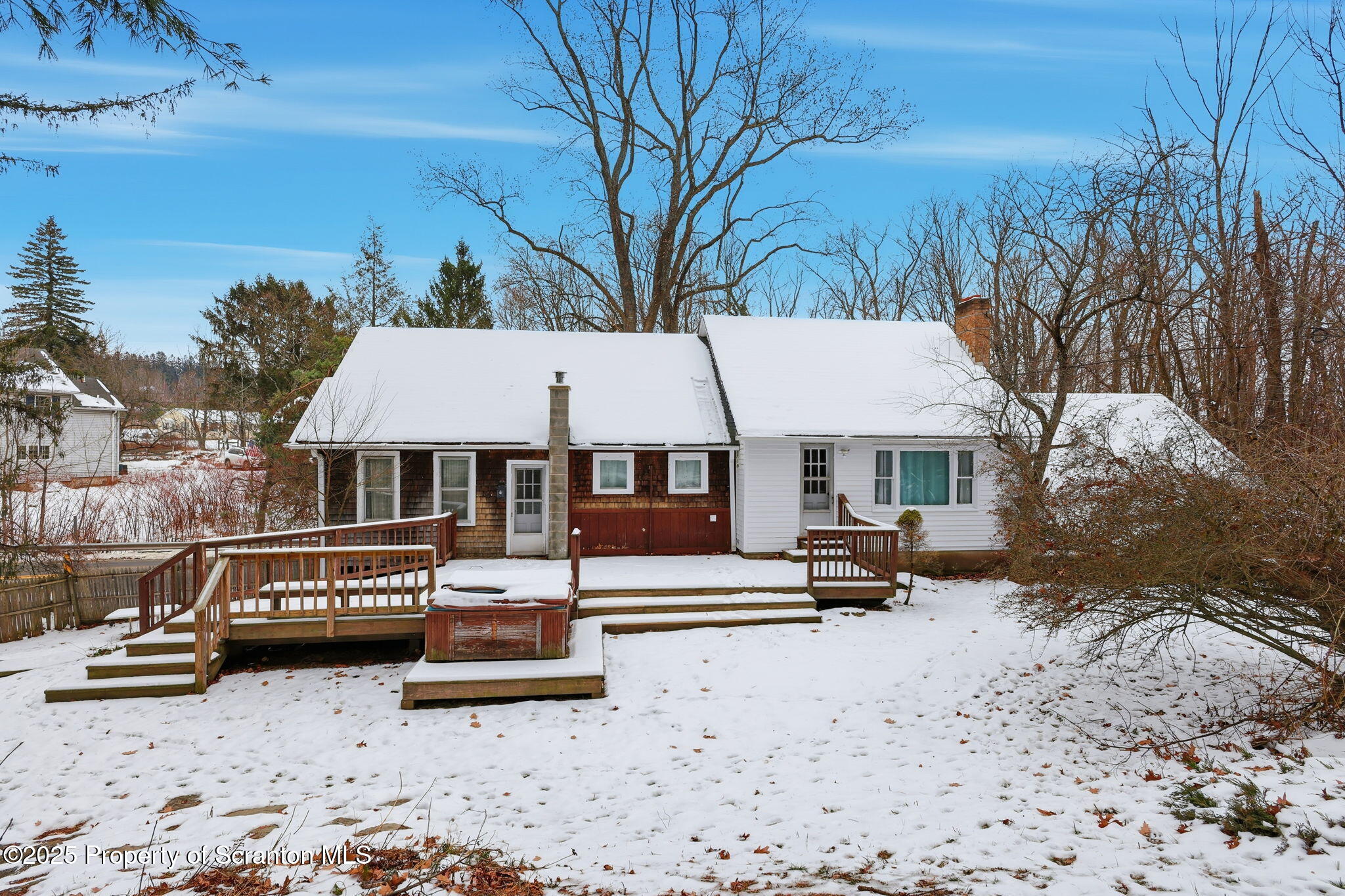 2457 Airport Road Forest City, PA 18421 - Photo 62 of 78 a view of a patio with a table and chairs under an umbrella