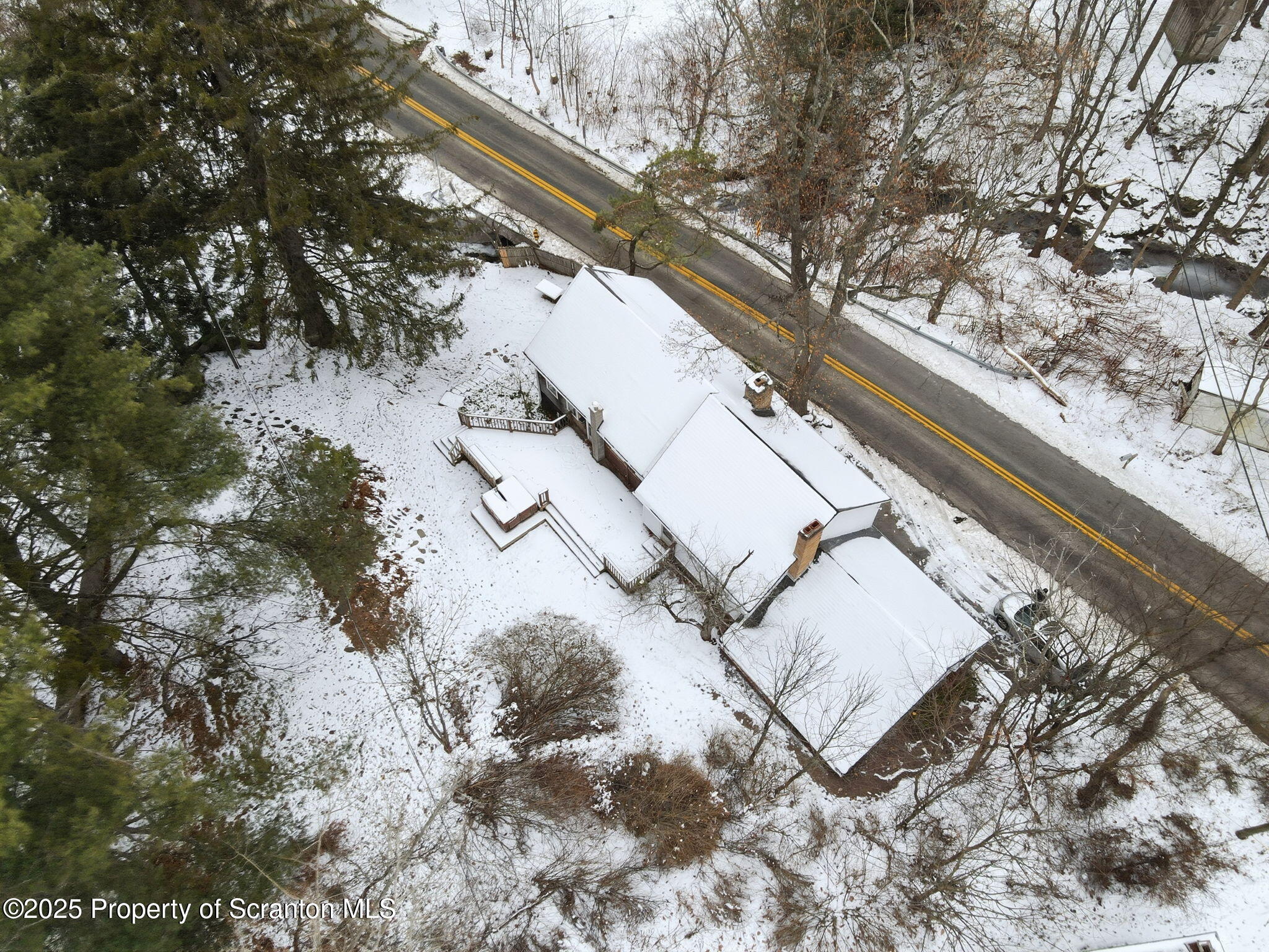2457 Airport Road Forest City, PA 18421 - Photo 68 of 78 a view of a yard with wooden fence