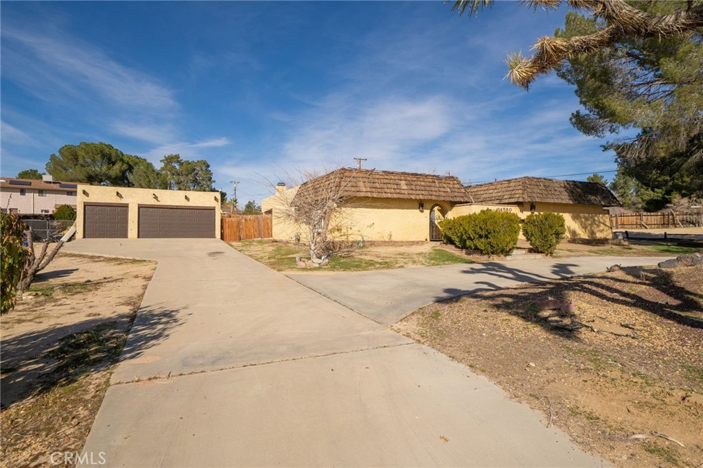 14580 Keota Road Apple Valley, CA 92307 - Photo 6 of 44 a view of a house with a snow on the road
