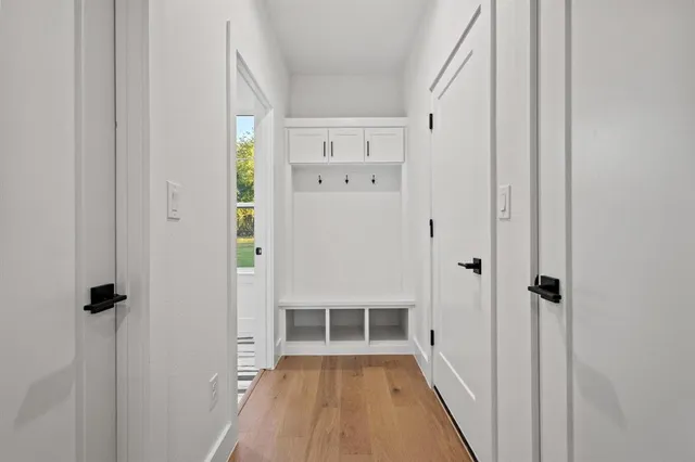 a view of kitchen with center island and stainless steel appliances