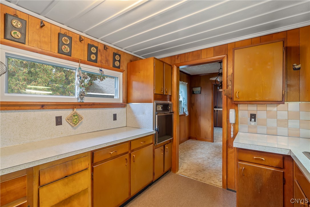8392 Tuttle Road Bridgeport, NY 13030 - Photo 8 of 32 The long countertop along the opposite wall is sma