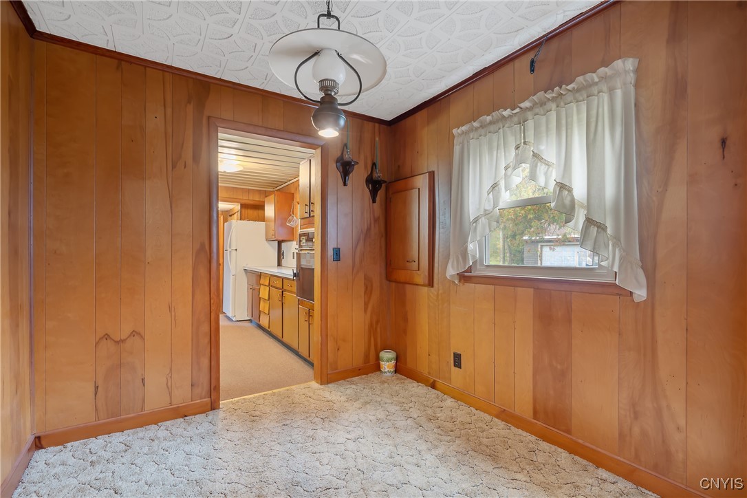 8392 Tuttle Road Bridgeport, NY 13030 - Photo 9 of 32 Just past the kitchen is the formal dining room. P