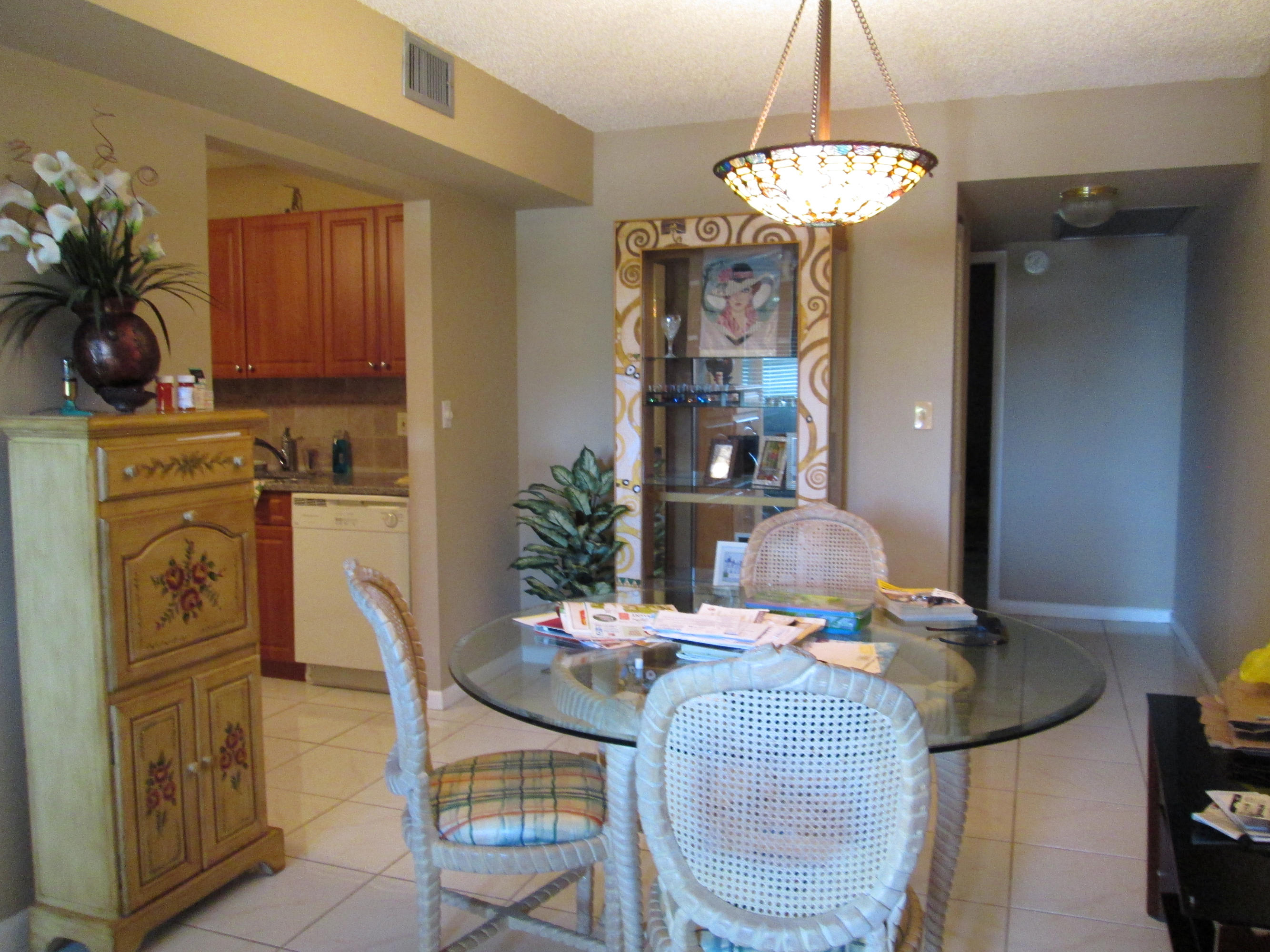 1029 Wolverton East, Unit 1029 Boca Raton, FL 33434 - Photo 6 of 9 dining room