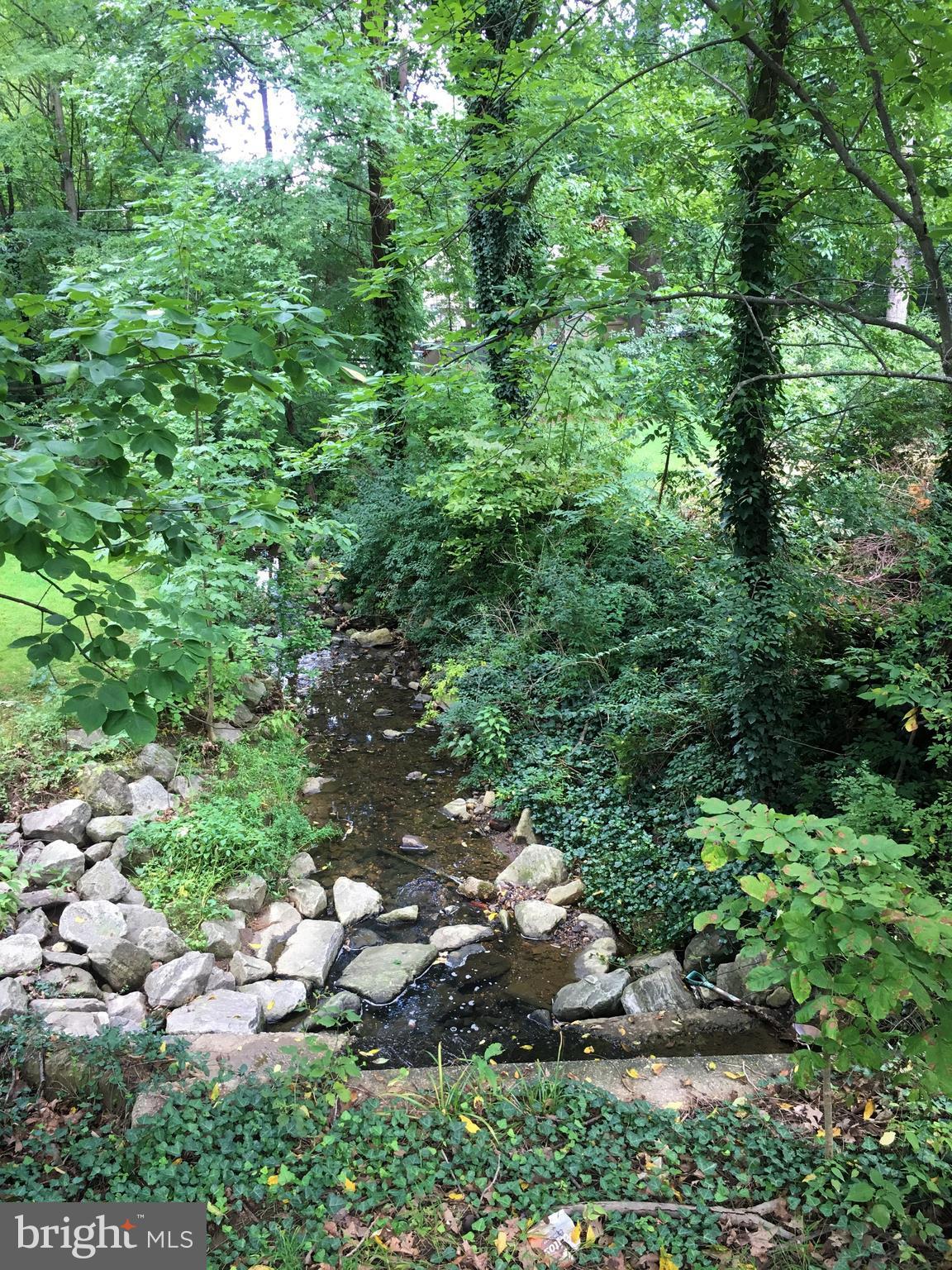 226 Sandee Road Lutherville-Timonium, MD 21093 - Photo 21 of 23 Stream running through back yard