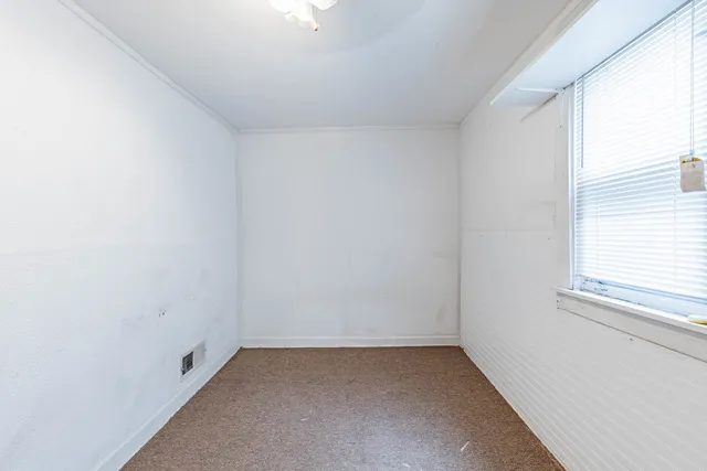 an empty room with a window