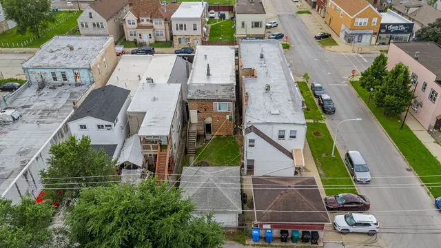 an aerial view of a city with lots of residential buildings