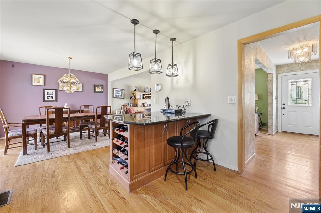 35 Robin Road Wayne, NJ 07470 - Photo 14 of 37 a view of a dining room with furniture and wooden floor