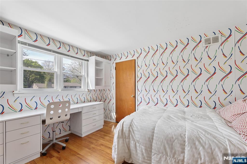 35 Robin Road Wayne, NJ 07470 - Photo 20 of 37 a bedroom with a bed and a window
