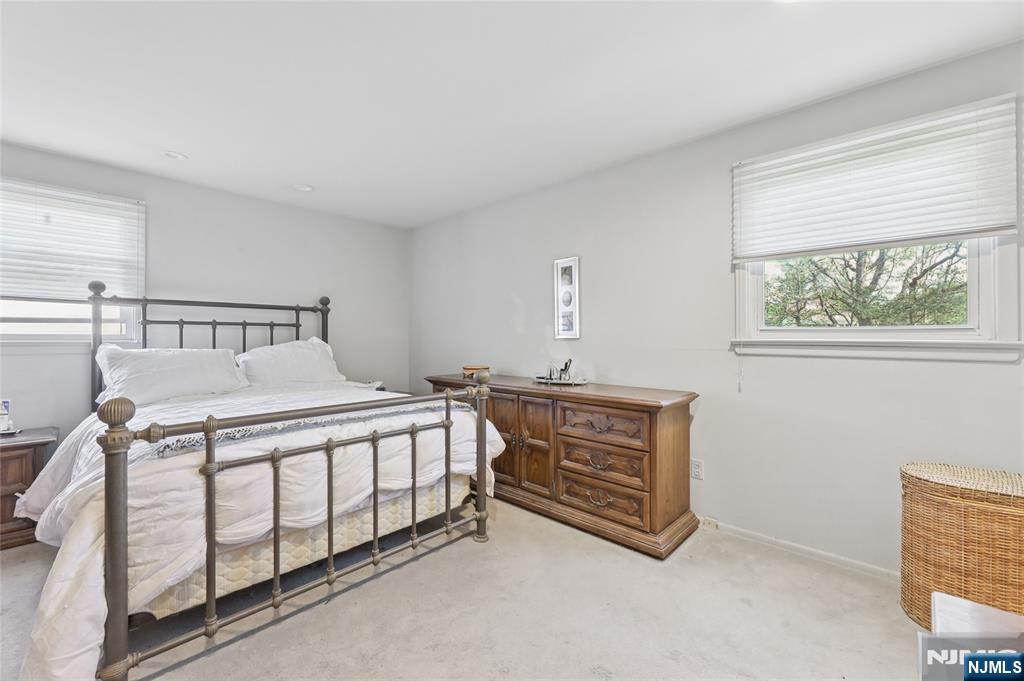 35 Robin Road Wayne, NJ 07470 - Photo 22 of 37 a bedroom with a bed and a window