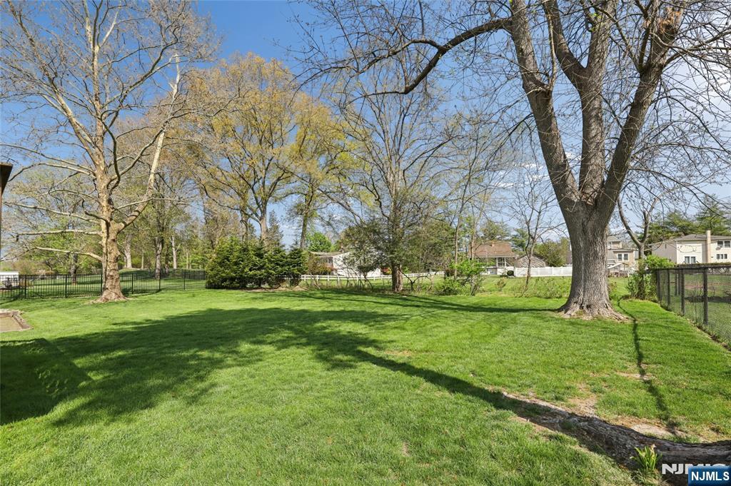 35 Robin Road Wayne, NJ 07470 - Photo 30 of 37 a view of a backyard with large trees