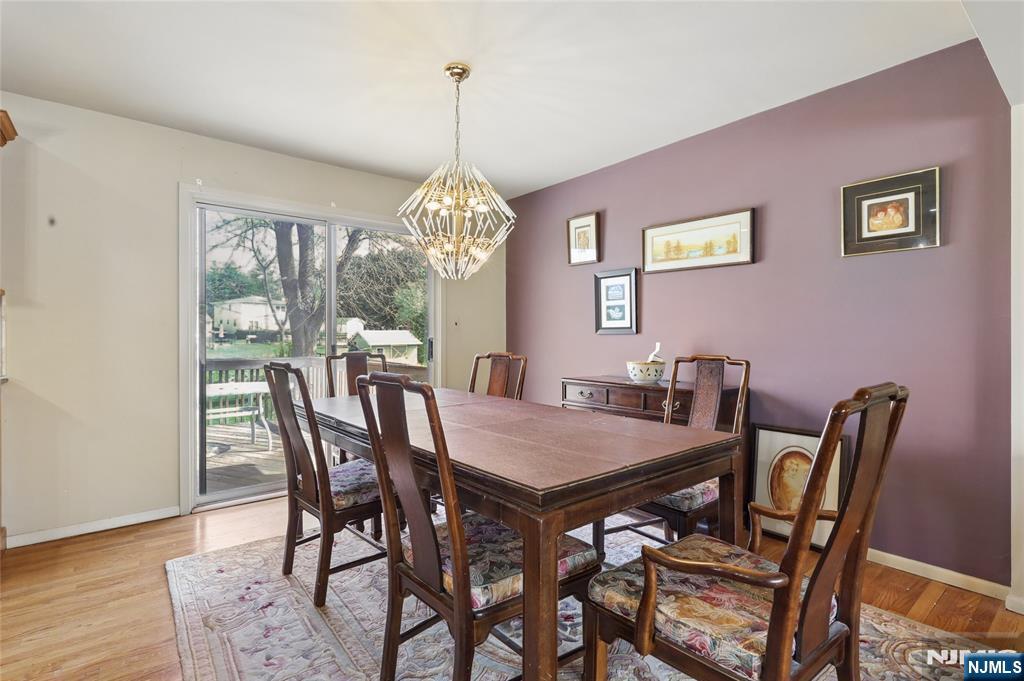 35 Robin Road Wayne, NJ 07470 - Photo 10 of 37 a view of a dining room with furniture window and wooden floor