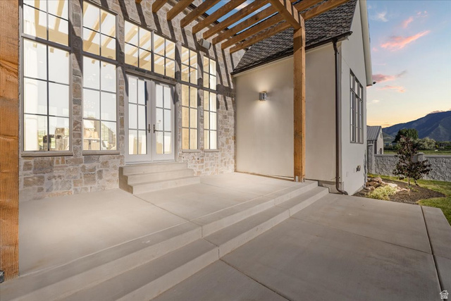 478 South Maple Lakes Drive Mapleton, UT 84664 - Photo 40 of 51 Expansive concrete patio with integrated steps leading to French doors
