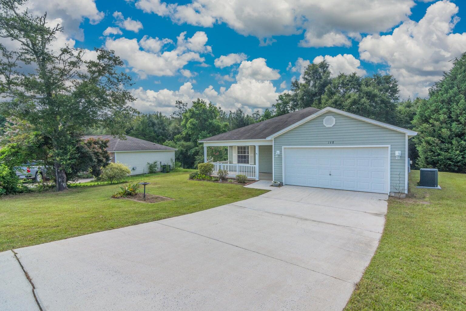 168 Cabana Way Crestview, FL 32536 - Photo 2 of 29 a front view of house with yard and green space