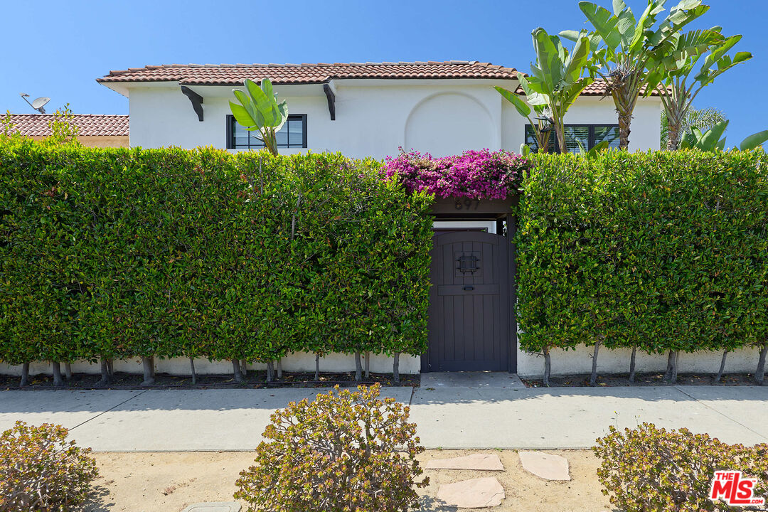 a front view of house with yard