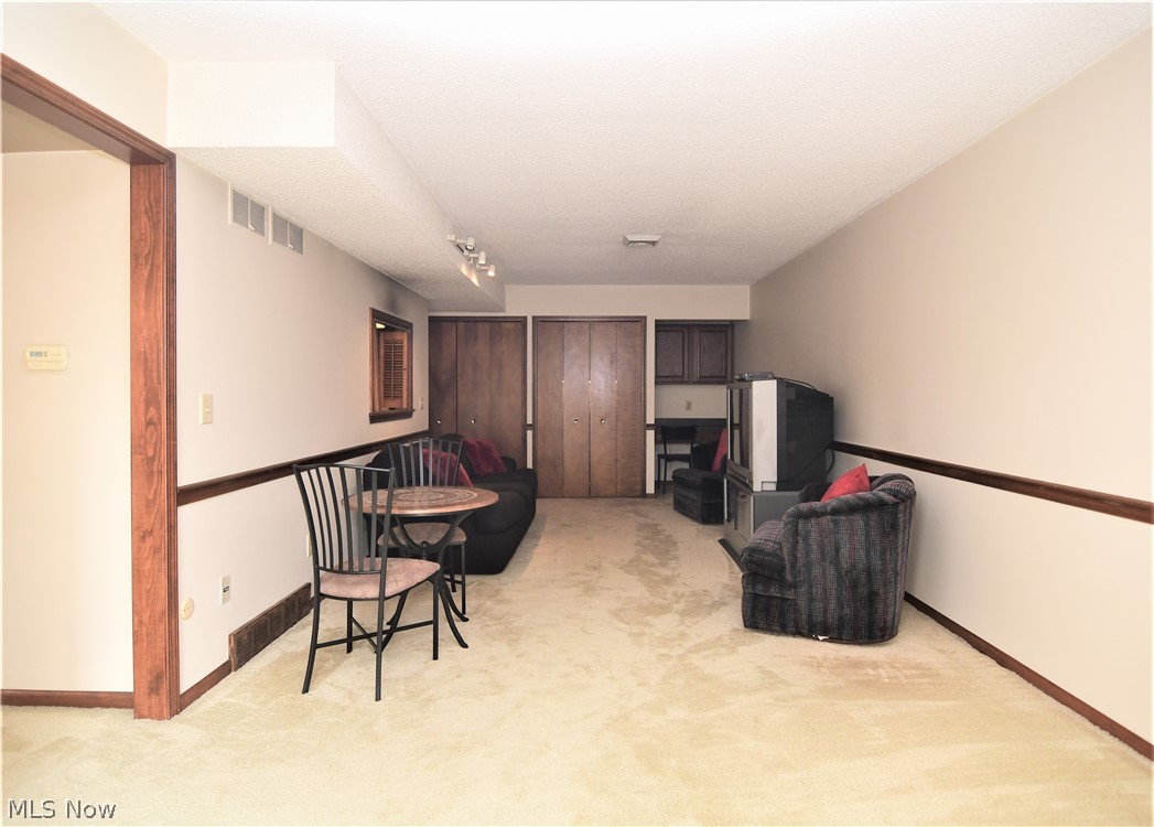 989 Hampton Ridge Drive Akron, OH 44313 - Photo 13 of 31 Family Room, Office Nook, Closet Storage