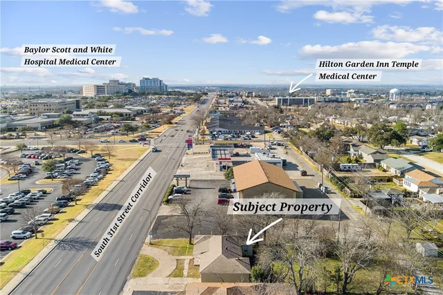 a view of a city with an ocean view