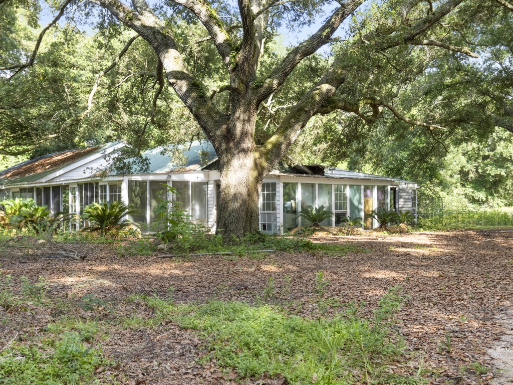 5714 Masters Manvel, TX 77578 - Photo 20 of 43 a front view of a house with a garden