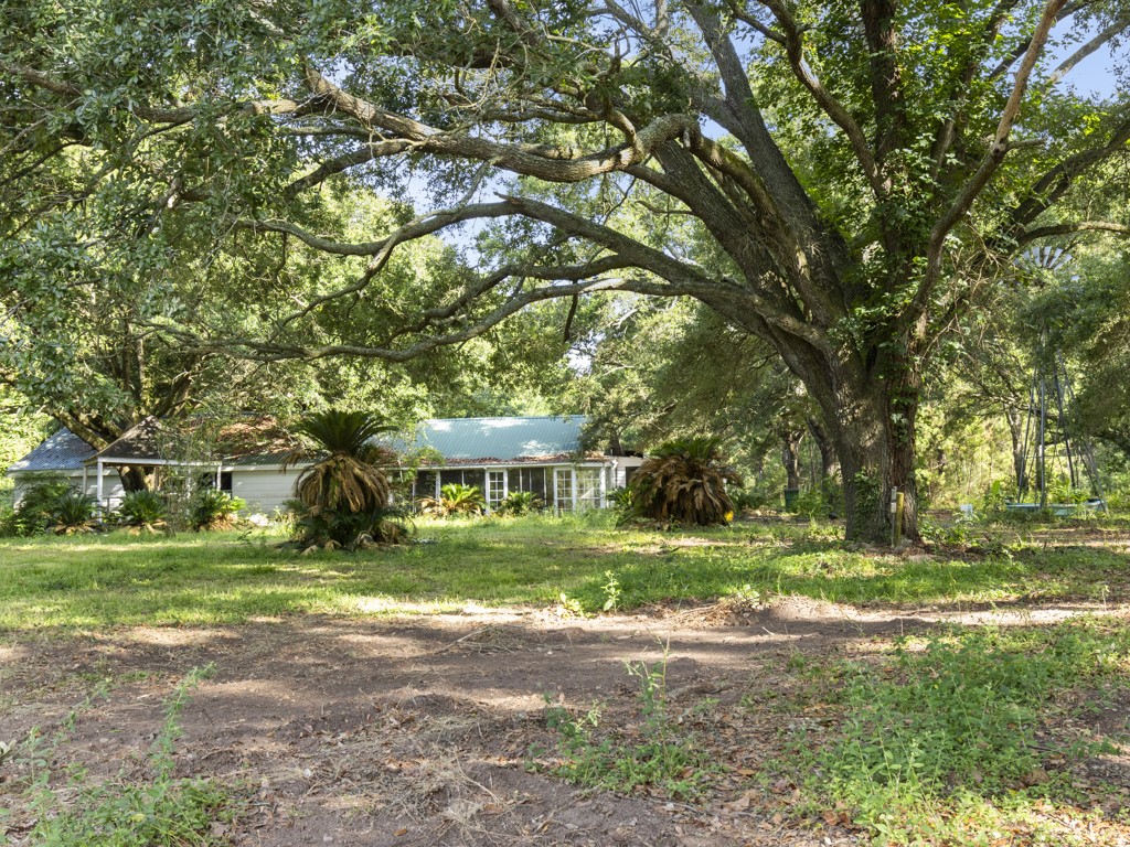 5714 Masters Manvel, TX 77578 - Photo 22 of 43 a view of a house with a yard
