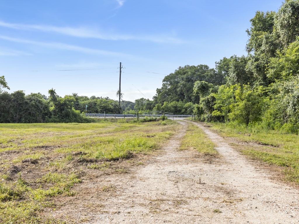 5714 Masters Manvel, TX 77578 - Photo 30 of 43 a view of a swimming pool with a yard