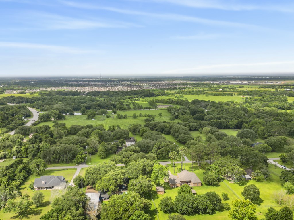 5714 Masters Manvel, TX 77578 - Photo 42 of 43 an aerial view of residential houses with outdoor space and trees