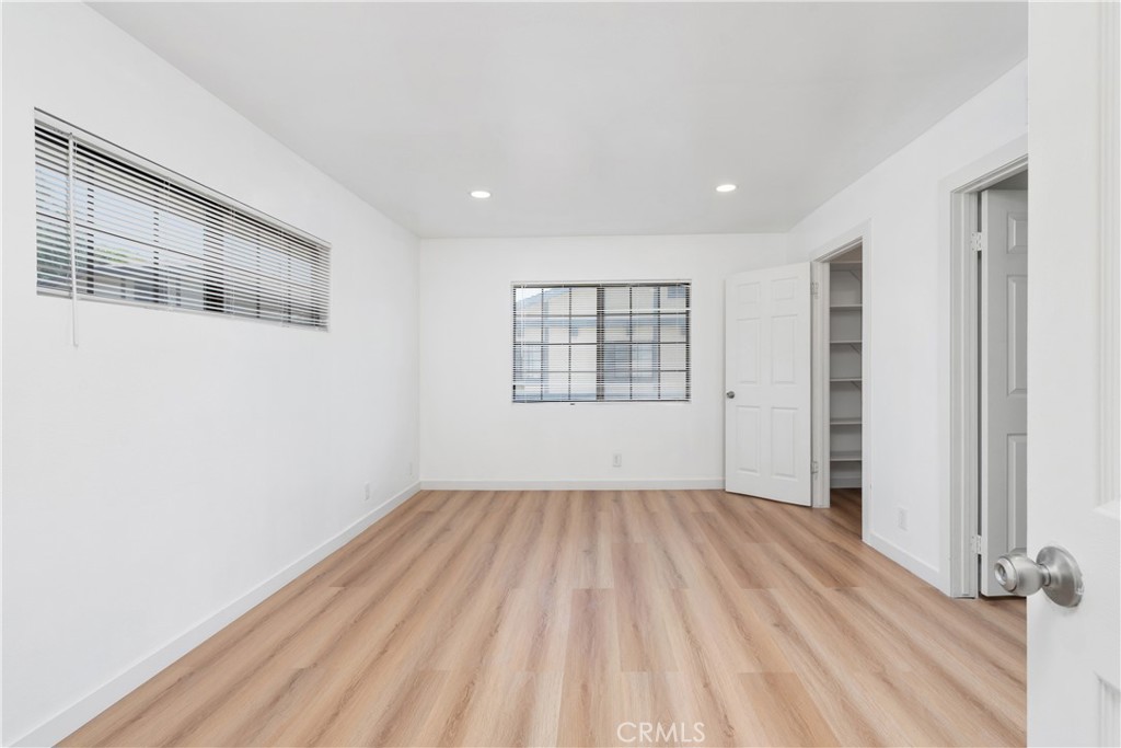 18435 Keswick, Unit 10 Reseda, CA 91335 - Photo 15 of 34 wooden floor in an empty room with a window