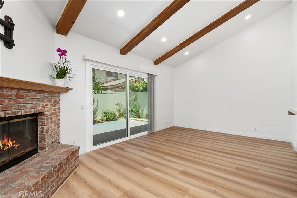 18435 Keswick, Unit 10 Reseda, CA 91335 - Photo 22 of 34 a living room with furniture and a fireplace