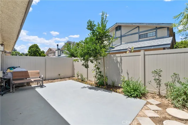 a picture of a table and chairs in patio