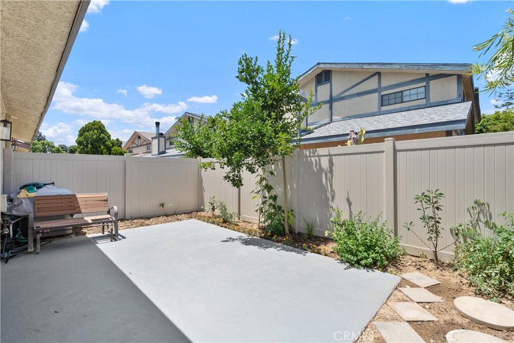 18435 Keswick, Unit 10 Reseda, CA 91335 - Photo 28 of 34 a picture of a table and chairs in patio