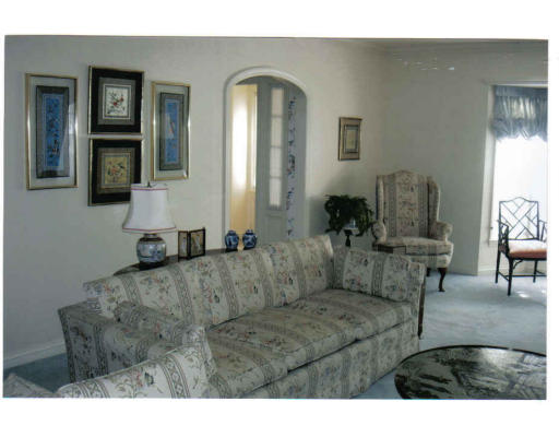 208 Florence Street Fall River, MA 02720 - Photo 3 of 8 a living room with furniture and a large mirror