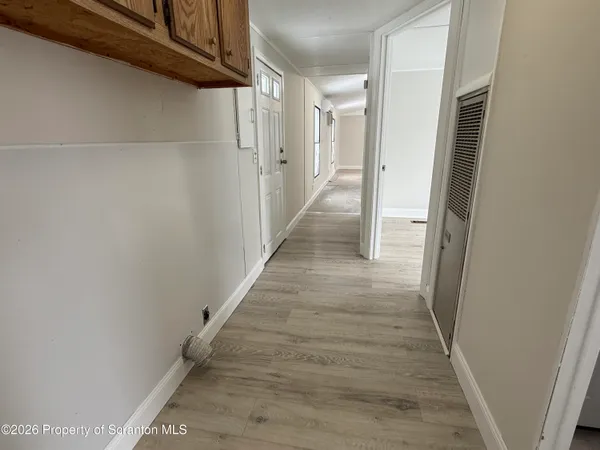a view of hallway with stairs