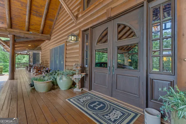 a bathroom with a sink a mirror and a lamp