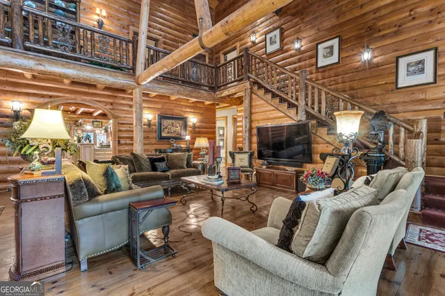 a spacious bathroom with a granite countertop sink toilet and shower
